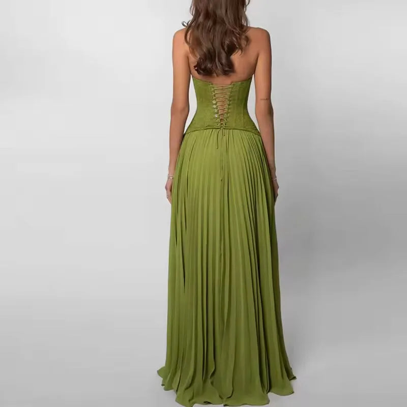 Women's green corset-style maxi dress with pleated skirt, front view