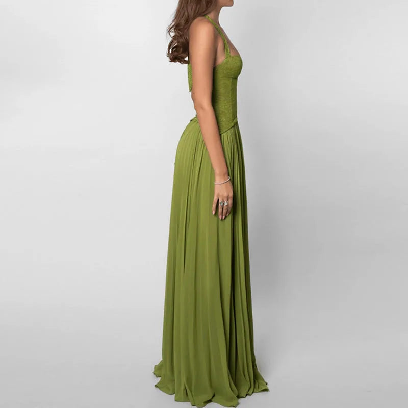 Women's green corset-style maxi dress with pleated skirt, side profile