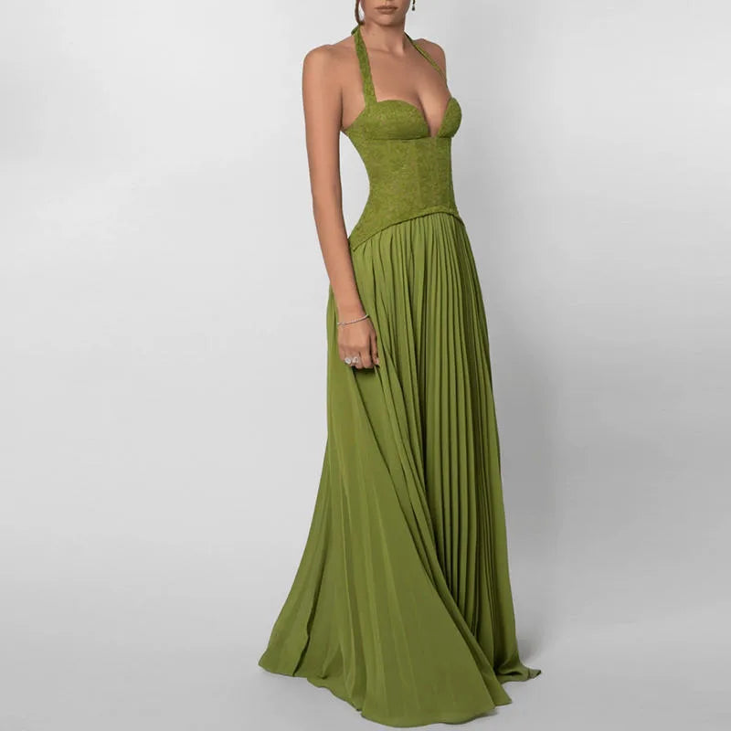Women's green corset-style maxi dress with pleated skirt, three-quarter view