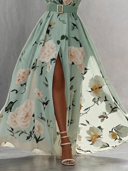 Women's green floral one-shoulder maxi dress with slit, close-up of the floral skirt and slit