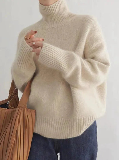 Women's high-neck soft sweater, beige, front view with tote bag