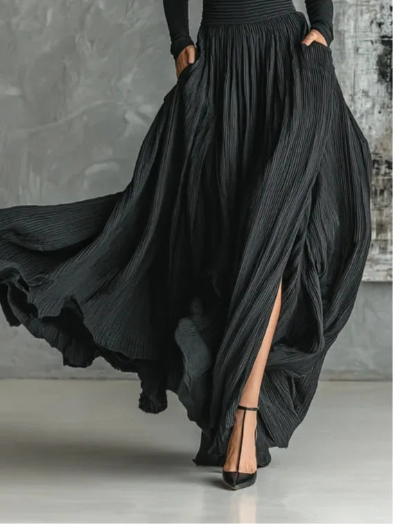 Women's high-neck top and pleated long skirt set, black, skirt in motion