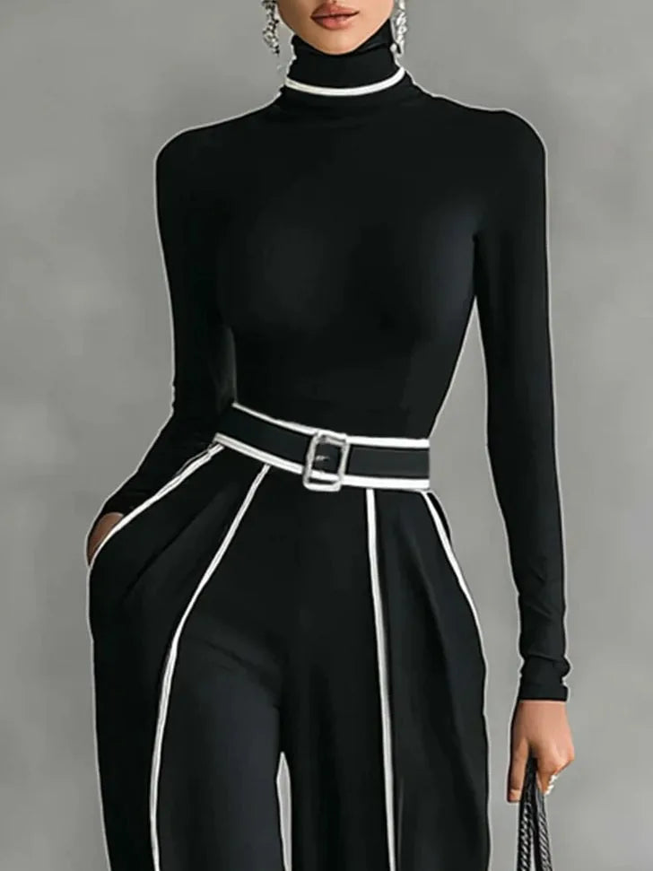 Women's high-neck top and wide-leg trousers set with contrast piping, black, close-up of the belt and piping