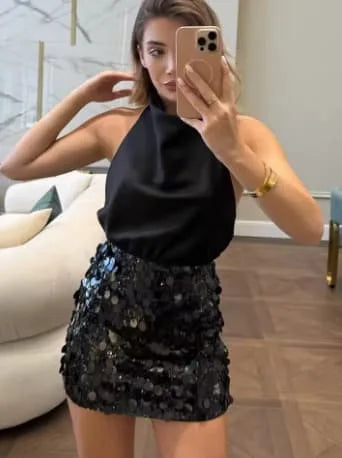 Women's high-waist sequin mini skirt, black, styled with a halter top
