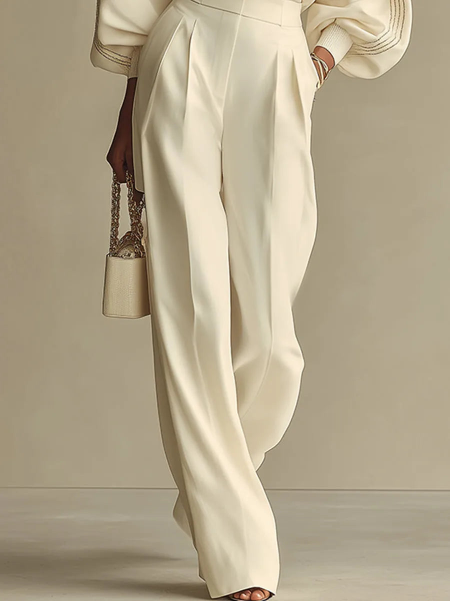 Women's ivory round-neck top and wide-leg trousers set, front view showing the wide-leg trousers