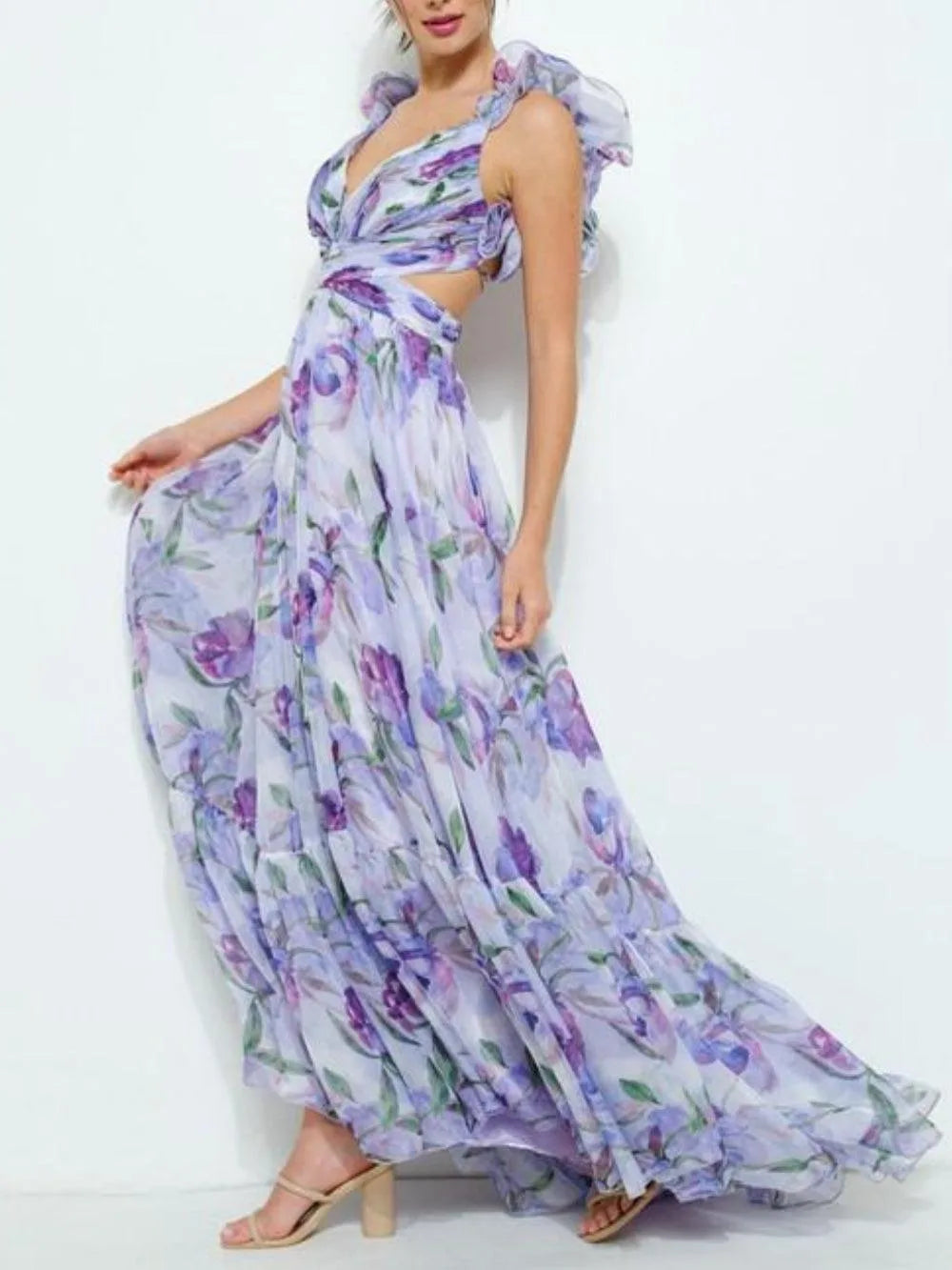 Women's lilac floral maxi dress with open back and short sleeves, front view with skirt in motion