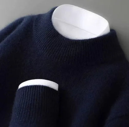 Women's mid-neck sweater with ribbed trim, blue, close-up of the neckline and cuff