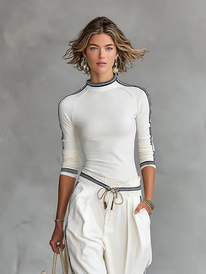 Women's mock-neck top and wide-leg drawstring pants set, white, close-up of the neckline and striped trim