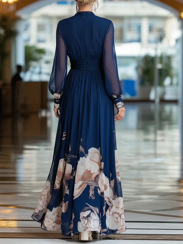 Women's navy floral V-neck maxi dress with sheer sleeves, back view