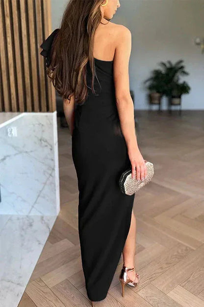 Women's one-shoulder ruffle maxi dress with high slit, black, back view