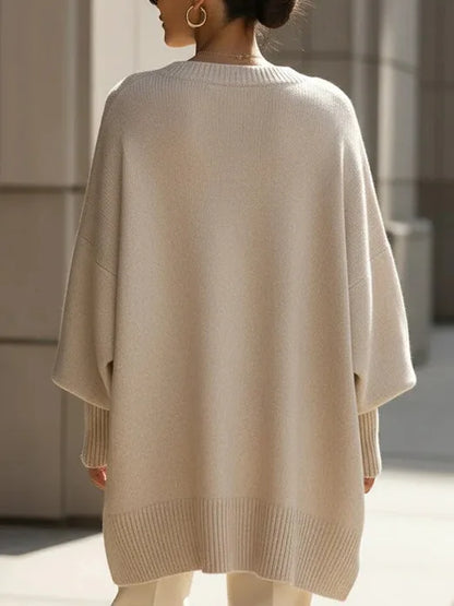 Women's oversized batwing sweater with side slits, cream, back view