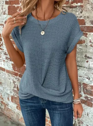 Women's relaxed short-sleeve top with twist hem, light blue, front view