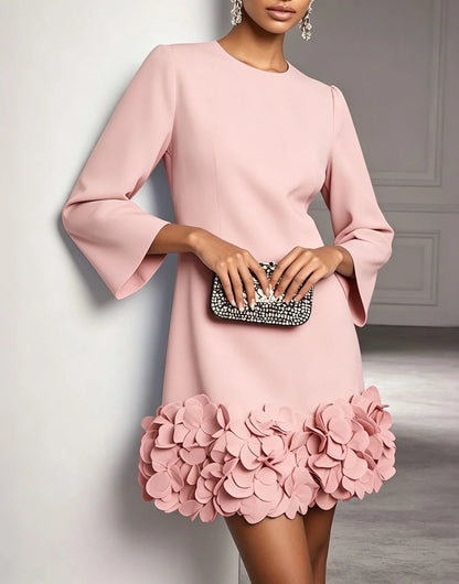 Women's round-neck shift mini dress with 3D floral hem, pink, front view with clutch