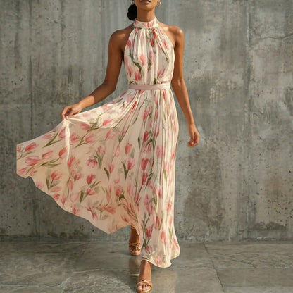Women's sleeveless floral halter maxi dress with A-line skirt, pink, skirt in motion