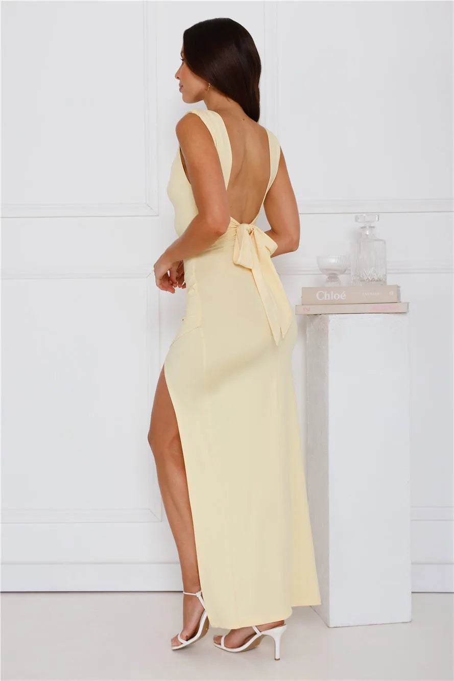 Women's square-neck maxi dress with thigh slit and tie back, yellow, back view with tie detail