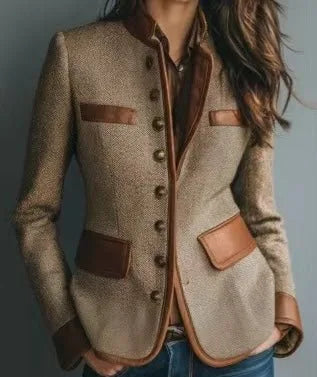 Women's tailored button-front blazer with brown contrast trim, close-up of the buttons and pockets