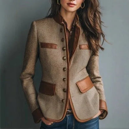 Women's tailored button-front blazer with brown contrast trim, front view