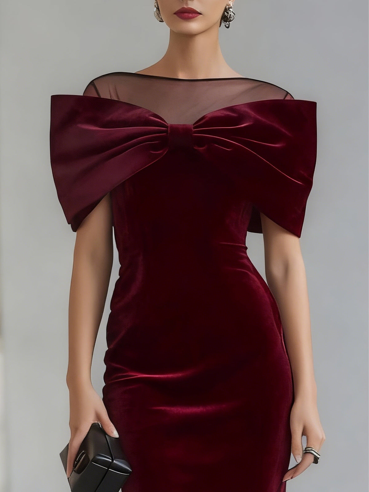 Large velvet bow on the chest