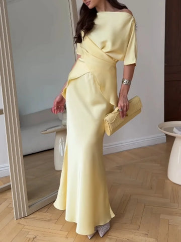 Women's yellow off-shoulder wrap top and long skirt set, front view