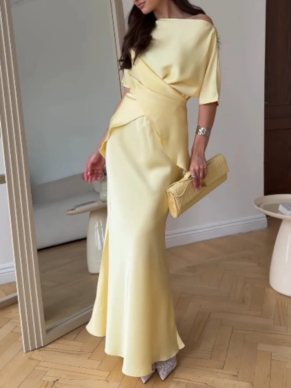 Women's yellow off-shoulder wrap top and long skirt set, front view
