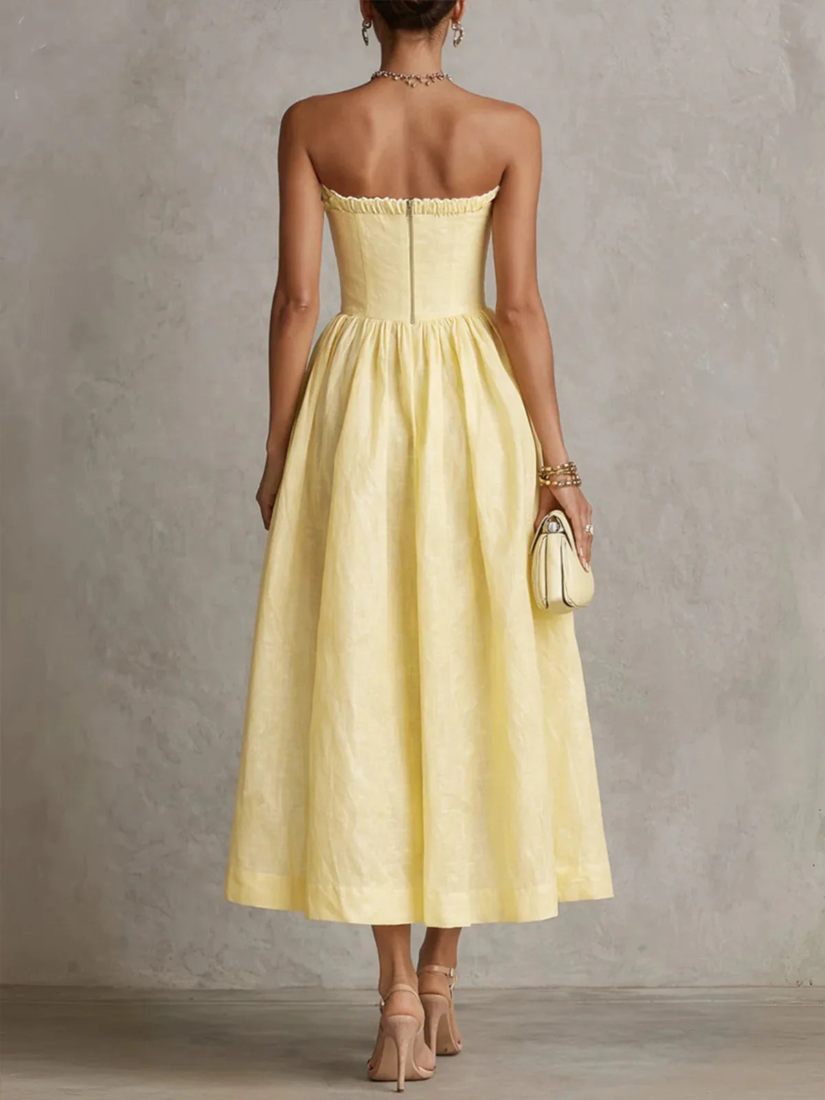 Women's yellow strapless midi dress with 3D flower bodice, back view