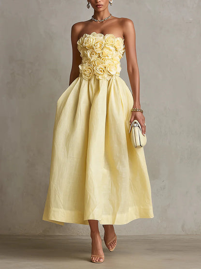 Women's yellow strapless midi dress with 3D flower bodice, front view